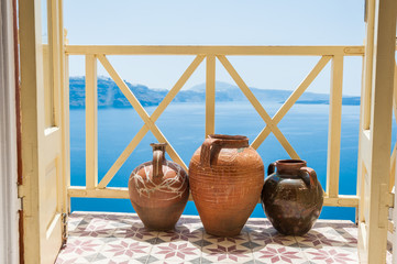 Decorative jugs on the balcony