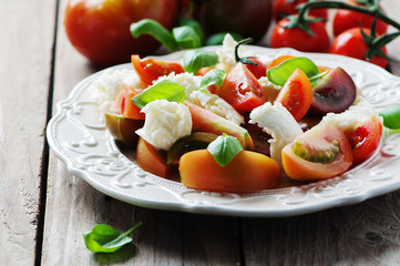 Traditional italian antipasto caprese with mozzarella