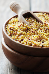 Uncooked sardinain pasta fregola
