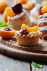 Sweet tarts with cherry and apricot