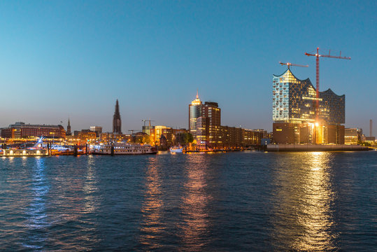 The Elbphilharmonie at night as main attraction in Hamburg. The building is deliberately designed Maritime. The forms are reminiscent of shipping and port