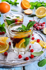 Drink with citrus and berries