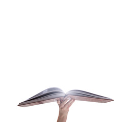 Hand holding o pened magic book with magic light. Education