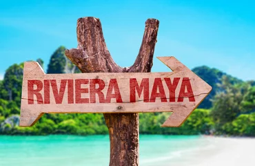Zelfklevend Fotobehang Riviera Maya wooden sign with beach background © gustavofrazao