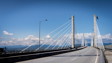 The Golden Ears Bridge over the Fraser River connecting the towns of Langley and Maple Ridge in the Fraser Valley of British Columbia