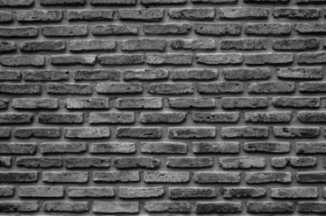 Monochrome brick wall texture, background