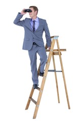 A businessman using binoculars while climbing on a ladder © WavebreakmediaMicro