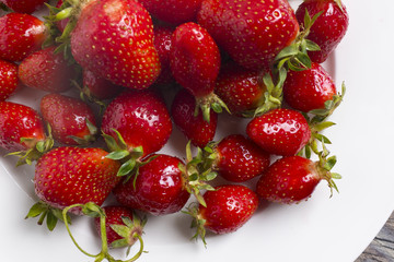 Strawberryes on white plate