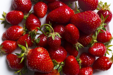 Strawberryes on white plate