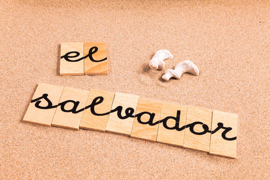 Words formed from small pieces of wood containing a sun and beach tourist destination, El Salvador