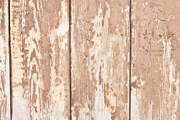 Brown peeling paint wooden desk texture.