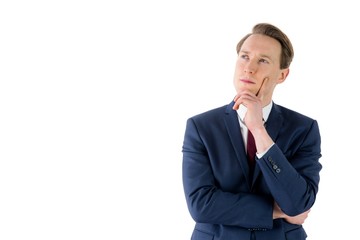 Thoughtful businessman looking away