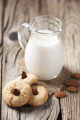 Cookies and jar with milk