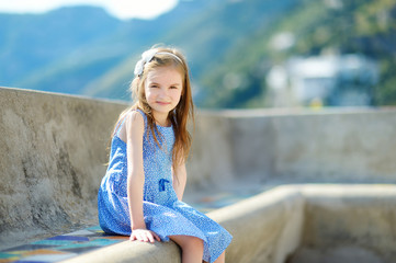Fototapeta na wymiar Adorable little girl on summer day