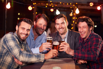 Group of friends at rooftop party