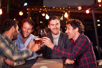 Group of friends at rooftop party