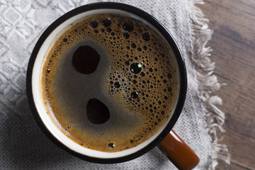 Black coffee in brown cup