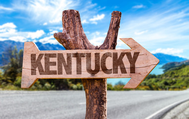 Kentucky wooden sign with road background