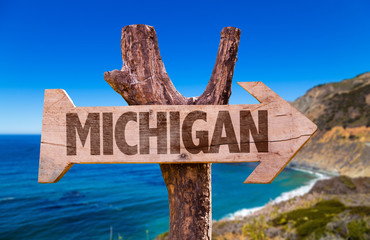 Michigan wooden sign with coastal background