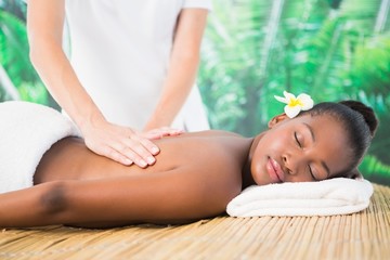 Pretty woman enjoying a back massage