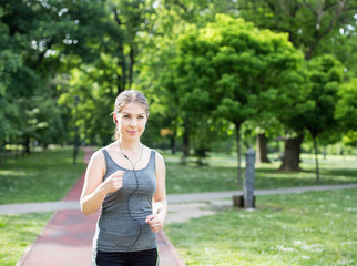 beautiful woman running across a sunny day