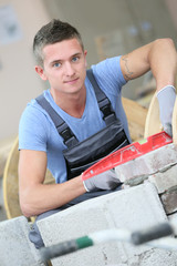 Young man in masonry professional school