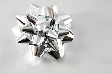 Silver Christmas Bow with some copy space. 