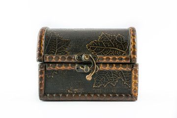 Antique engraved wooden jewelry box isolated on white background