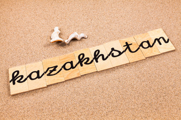 Words formed from small pieces of wood containing a sun and beach tourist destination, Kazakhstan