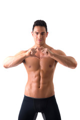 Fototapeta premium Shirtless muscular man making heart sing with hands
