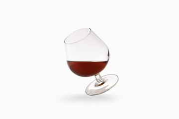 Cognac in glass isolated on white background