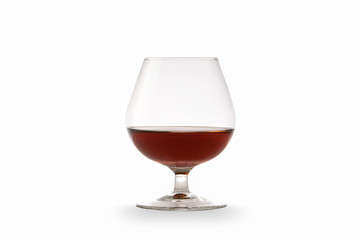 Cognac in glass isolated on white background