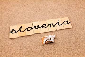 Words formed from small pieces of wood containing a sun and beach tourist destination, Slovenia