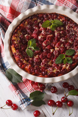 cherry pie Clafoutis closeup vertical top view
