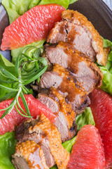 Roast duck breast with lettuce and grapefruit