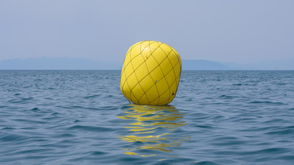 Yellow buoy for regatta