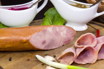 sausage on a wooden plate in a restaurant