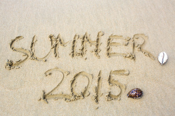 Fototapeta premium inscription on the sand word summer