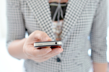 Young girl touching smart phone