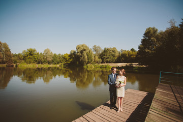 Fototapeta na wymiar Wedding couple on the lake