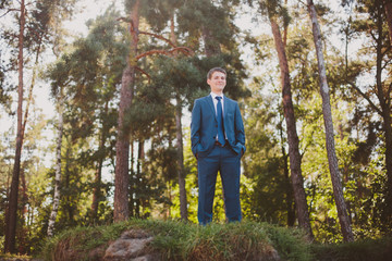 Groom smiling outdoors nature
