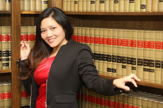 Asian American Woman in Law Office