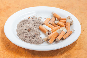 Pile of cigarette butts and ashes