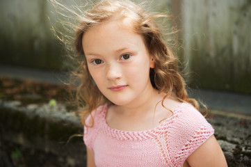 Close up portrait of a cute little girl of 7 years old © annanahabed