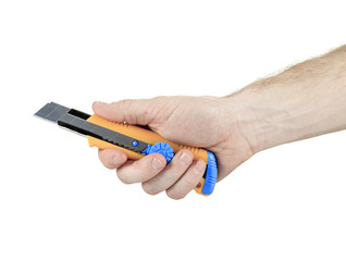 a man holding an exacto tool