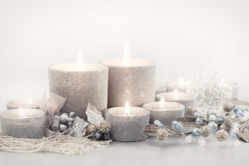 Fototapeta na wymiar Silver Vintage style Christmas Candles & Ornaments