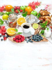 Fototapeta na wymiar Breakfast table setting with coffee and croissants. Healthy food