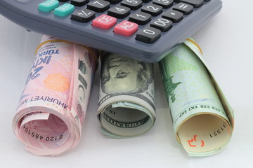 calculator on the money roll