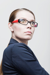 Portrait of angry businesswoman with glasses