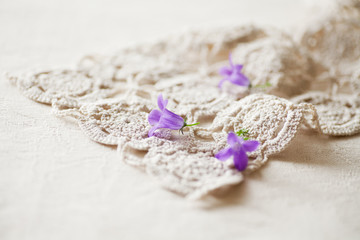 Spring Flowers, Campanula, on Crocheted Doily